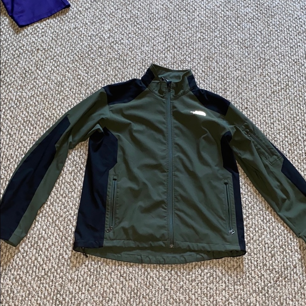 Green and black large north face jacket